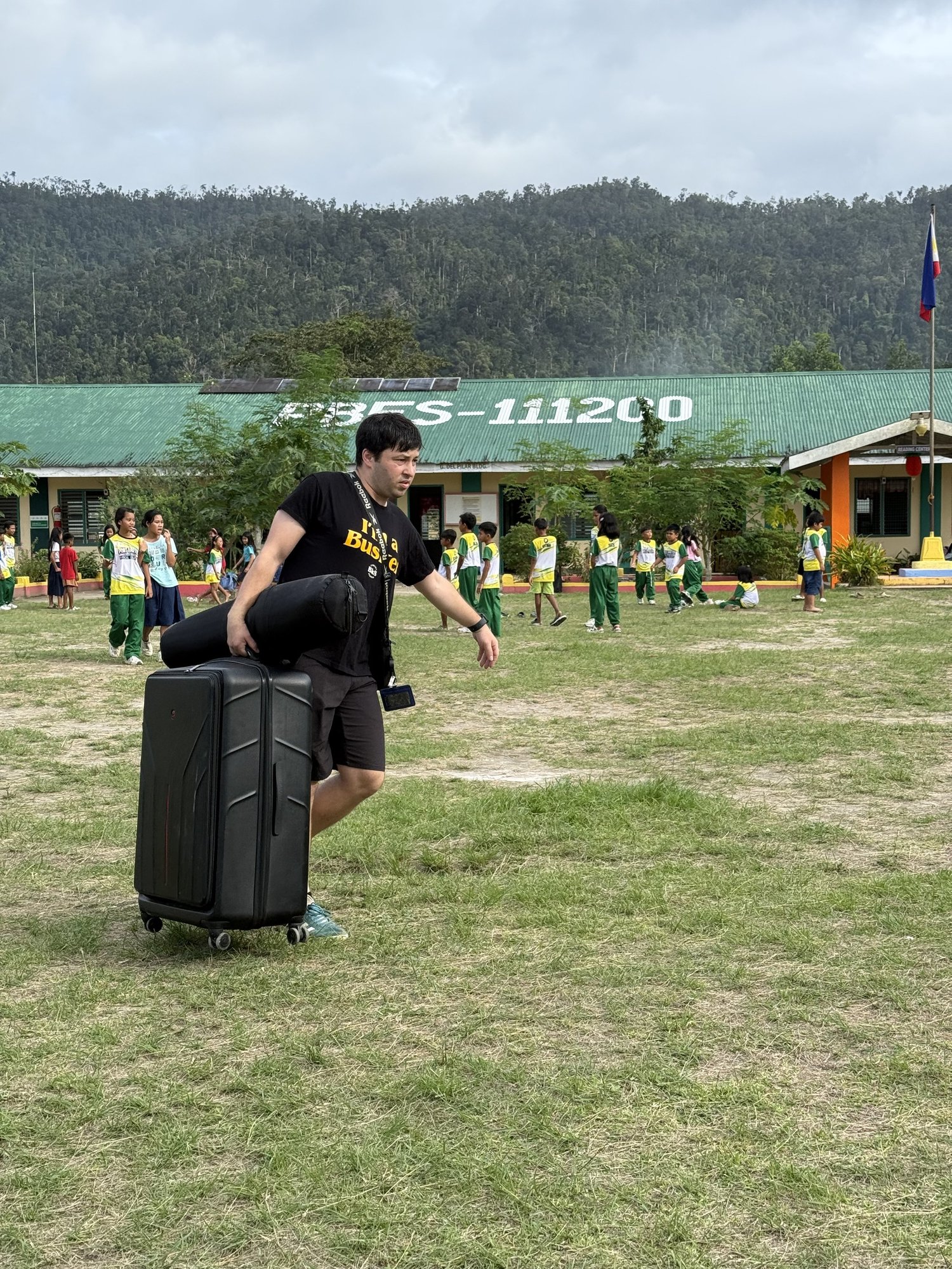 Walking into a schoolyard in Palawan